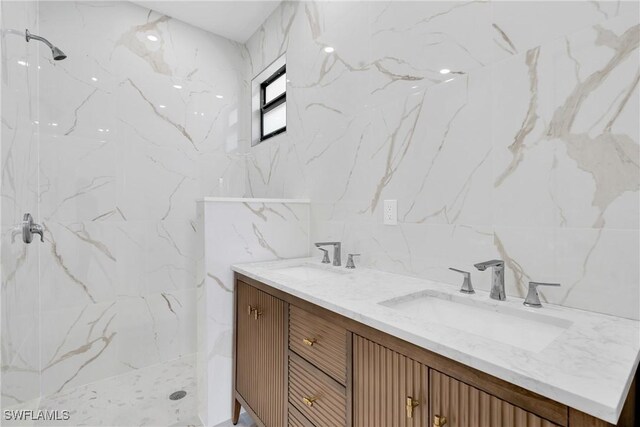 331 Naples Ave S, Lehigh Acres, FL 33974 - full bath featuring a marble finish shower, double vanity, and tile walls