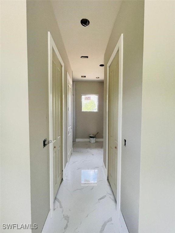 1601 W 9th St, Lehigh Acres, FL 33972 - hall with light marble finish flooring and baseboards