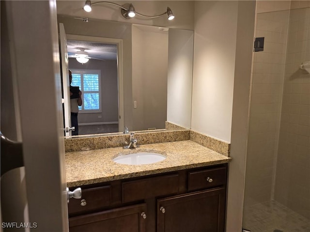 605 Squire Cir Unit 203, Naples, FL 34104 - bathroom featuring vanity and a stall shower