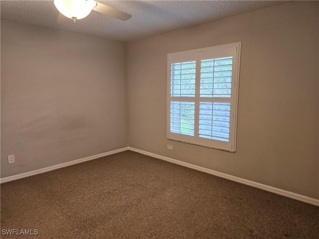 605 Squire Cir Unit 203, Naples, FL 34104 - unfurnished room with dark colored carpet, a textured ceiling, and a ceiling fan