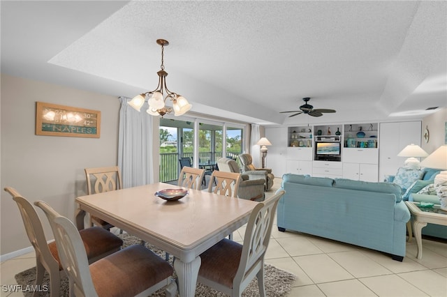 601 Teryl Rd Unit 2262, Naples, FL 34112 - dining area featuring a ceiling fan, light tile patterned flooring, and a textured ceiling