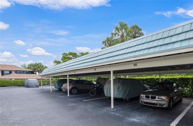 3055 Riviera Dr Unit 306, Naples, FL 34103 - view of covered parking lot