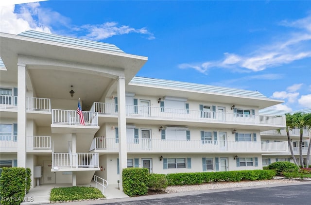 3055 Riviera Dr Unit 306, Naples, FL 34103 - view of apartment building / complex