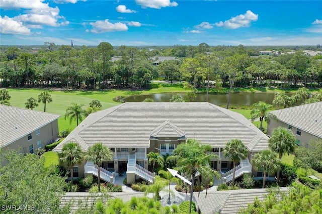 1940 Willow Bend Cir Unit 102, Naples, FL 34109 - view from above of property featuring a tree filled landscape and a large body of water