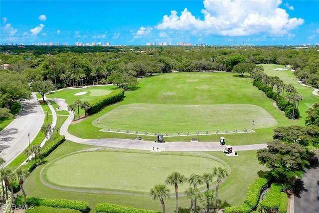 1940 Willow Bend Cir Unit 102, Naples, FL 34109 - view of urban area with a tree filled landscape and a golf club