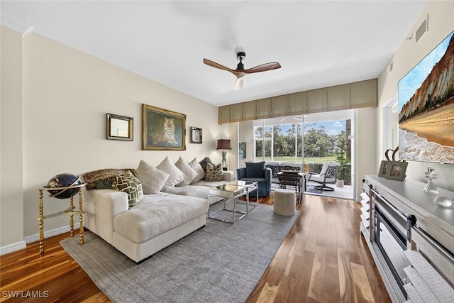 1940 Willow Bend Cir Unit 102, Naples, FL 34109 - living room with wood finished floors and ceiling fan