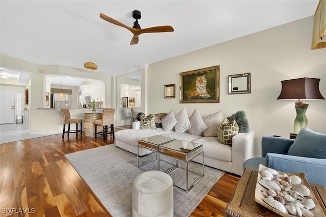 1940 Willow Bend Cir Unit 102, Naples, FL 34109 - living area with ceiling fan and wood finished floors