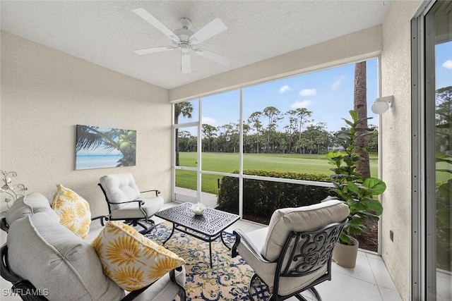 1940 Willow Bend Cir Unit 102, Naples, FL 34109 - sunroom / solarium featuring a ceiling fan and view of golf course