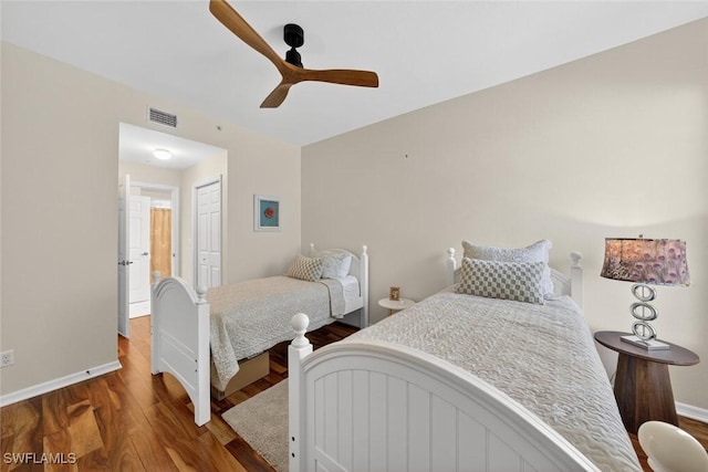 1940 Willow Bend Cir Unit 102, Naples, FL 34109 - bedroom featuring wood finished floors, a closet, and ceiling fan