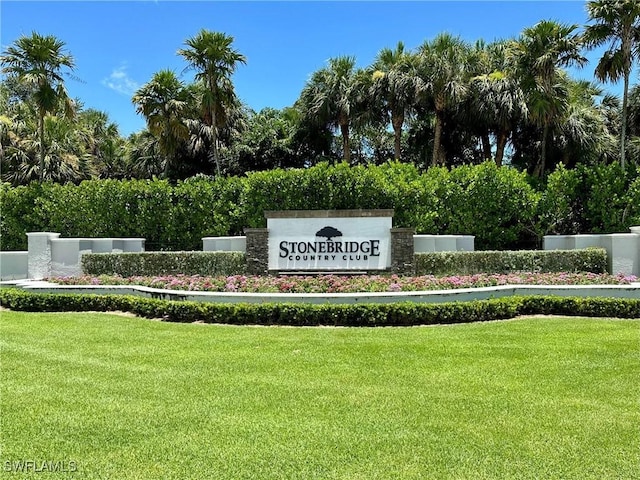 1940 Willow Bend Cir Unit 102, Naples, FL 34109 - community / neighborhood sign with a lawn