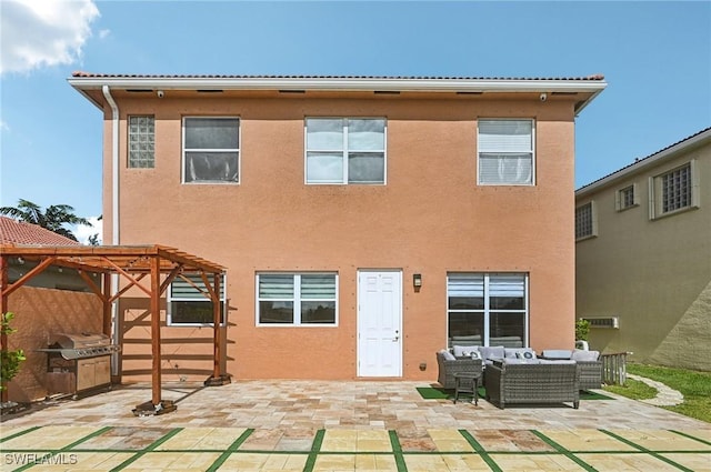 7082 Aliso Ave, West Palm Beach, FL 33413 - rear view of house with outdoor lounge area, a pergola, a patio, and stucco siding
