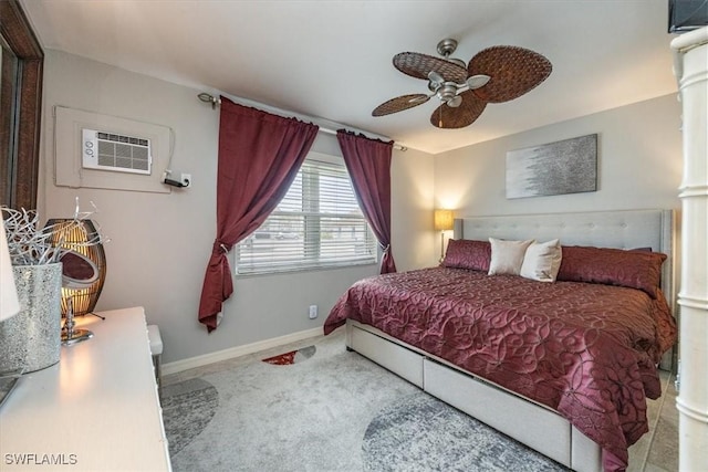 235 Seaview Ct Unit B2, Marco Island, FL 34145 - bedroom featuring carpet flooring, baseboards, a wall mounted AC, ceiling fan, and ornate columns