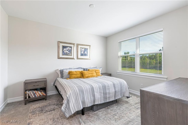 1050 Enbrook Loop, Naples, FL 34114 - carpeted bedroom with baseboards
