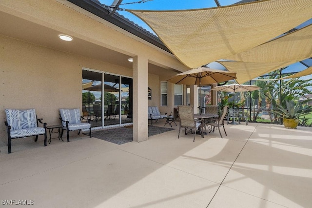 12455 Muddy Creek Ln, Fort Myers, FL 33913 - view of patio featuring outdoor dining space