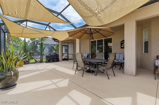 12455 Muddy Creek Ln, Fort Myers, FL 33913 - view of patio / terrace with glass enclosure, outdoor dining space, and grilling area