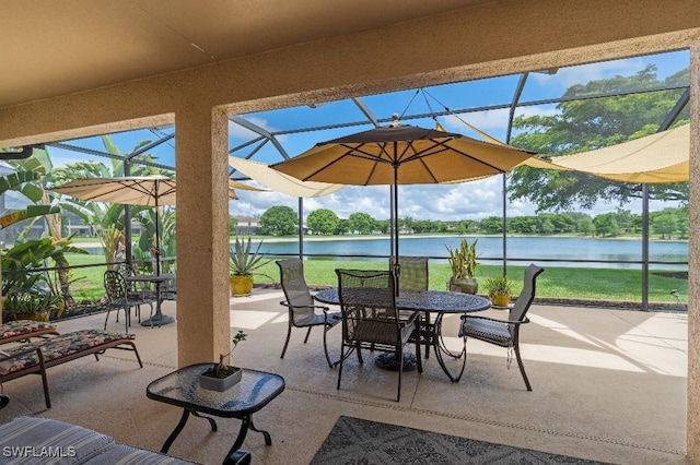 12455 Muddy Creek Ln, Fort Myers, FL 33913 - view of patio with a lanai, a water view, and outdoor dining space