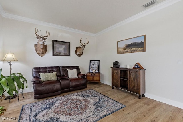 12455 Muddy Creek Ln, Fort Myers, FL 33913 - living area with crown molding, wood finished floors, and baseboards