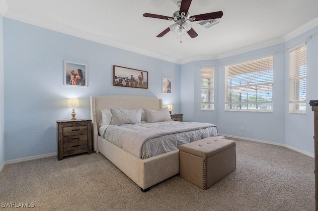 12455 Muddy Creek Ln, Fort Myers, FL 33913 - bedroom with multiple windows, light carpet, crown molding, baseboards, and a ceiling fan