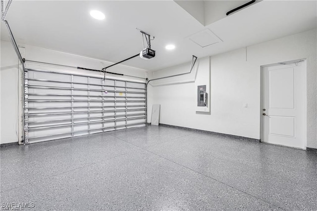837 Grant Blvd, Lehigh Acres, FL 33974 - garage featuring electric panel and a garage door opener