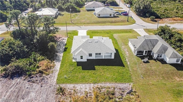 837 Grant Blvd, Lehigh Acres, FL 33974 - aerial perspective of suburban area