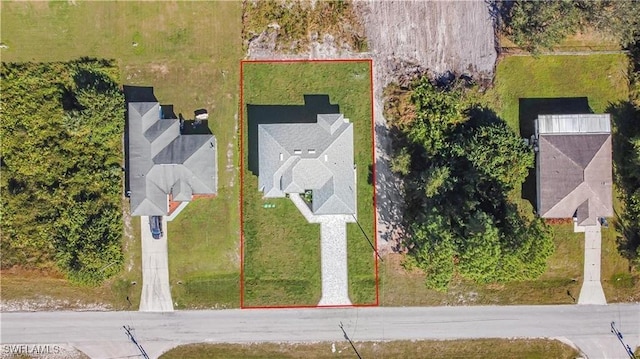 837 Grant Blvd, Lehigh Acres, FL 33974 - aerial view of property and surrounding area featuring property parcel outlined