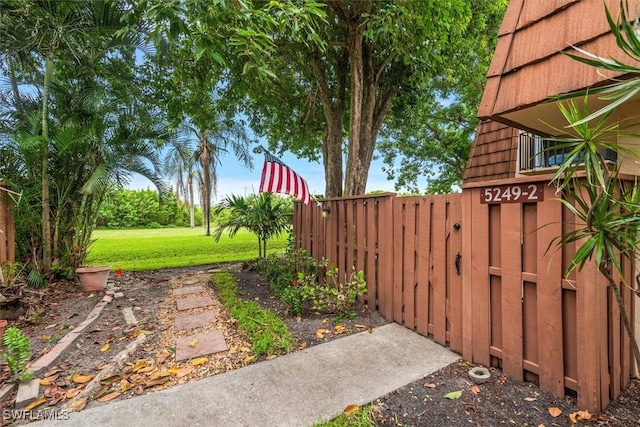 5249 Cedarbend Dr Unit 2, Fort Myers, FL 33919 - view of yard featuring a gate