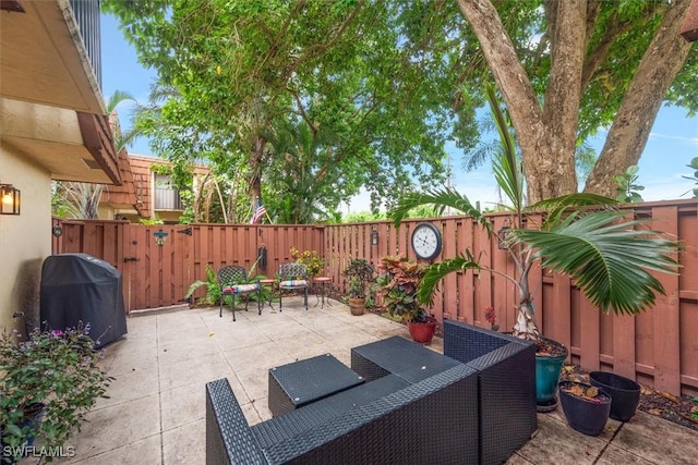 5249 Cedarbend Dr Unit 2, Fort Myers, FL 33919 - fenced backyard featuring grilling area and a patio area