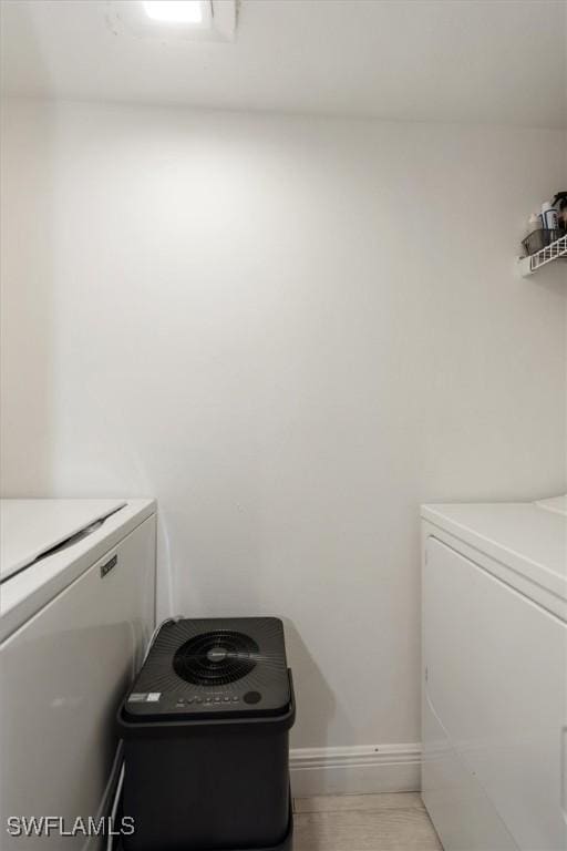 5249 Cedarbend Dr Unit 2, Fort Myers, FL 33919 - laundry room featuring washer and clothes dryer and baseboards