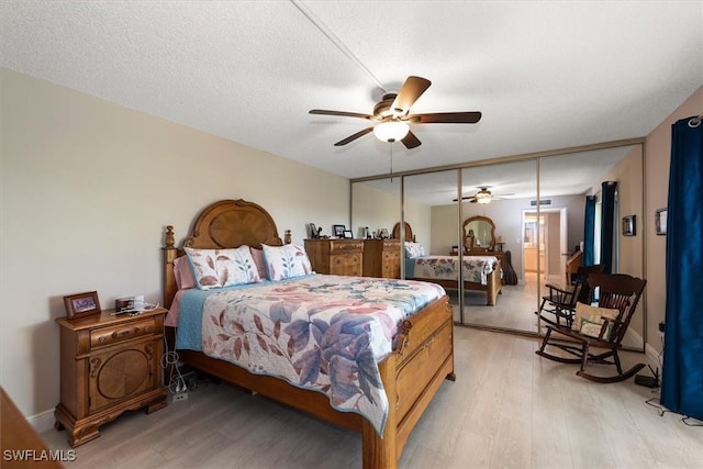 5249 Cedarbend Dr Unit 2, Fort Myers, FL 33919 - bedroom with light wood-style flooring and a ceiling fan