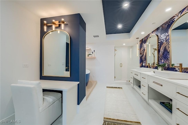 350 S Collier Blvd Unit 1103, Marco Island, FL 34145 - bathroom featuring a freestanding bath, double vanity, a shower stall, recessed lighting, and a tray ceiling