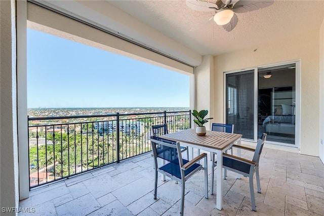 350 S Collier Blvd Unit 1103, Marco Island, FL 34145 - balcony featuring ceiling fan and outdoor dining space