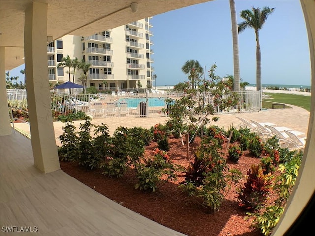 7360 Estero Blvd Unit 1102, Fort Myers Beach, FL 33931 - community pool with a patio area