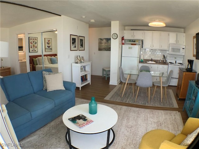 7360 Estero Blvd Unit 1102, Fort Myers Beach, FL 33931 - living room featuring dark wood finished floors
