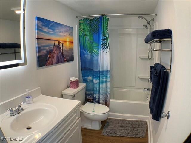 7360 Estero Blvd Unit 1102, Fort Myers Beach, FL 33931 - full bath featuring wood finished floors, shower / tub combo with curtain, and vanity