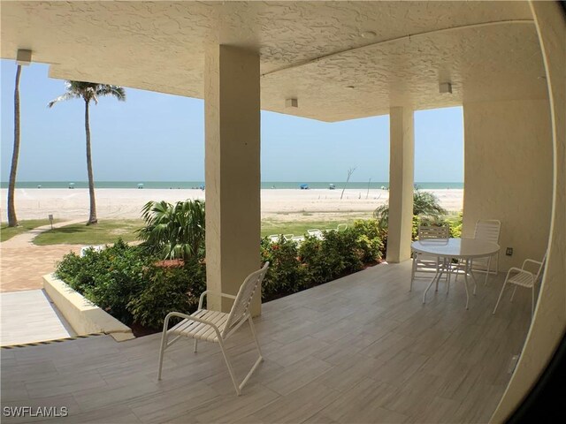 7360 Estero Blvd Unit 1102, Fort Myers Beach, FL 33931 - view of patio with view of water and beach