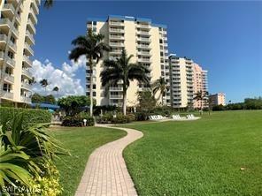 7360 Estero Blvd Unit 1102, Fort Myers Beach, FL 33931 - view of property's community featuring a lawn