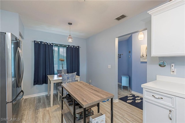164 Belina Dr E Unit 4, Naples, FL 34104 - dining area with light wood-type flooring
