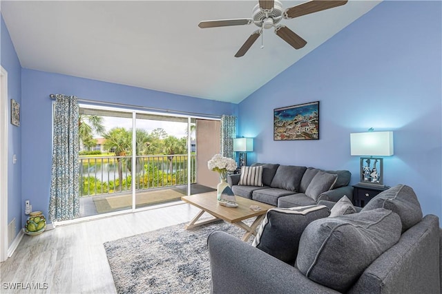 164 Belina Dr E Unit 4, Naples, FL 34104 - living area with wood finished floors, a ceiling fan, and high vaulted ceiling