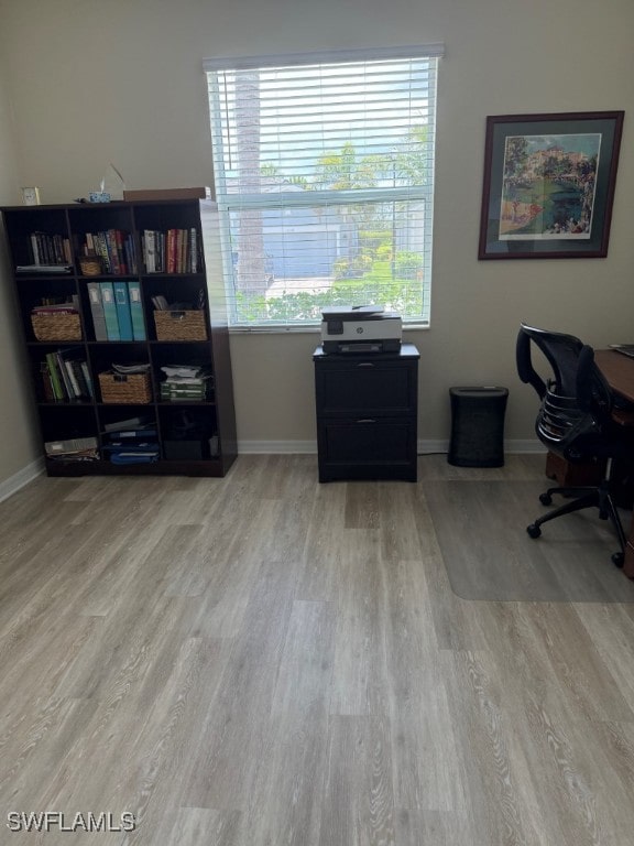 16249 Bonita Landing Cir, Bonita Springs, FL 34135 - office space featuring wood finished floors and baseboards