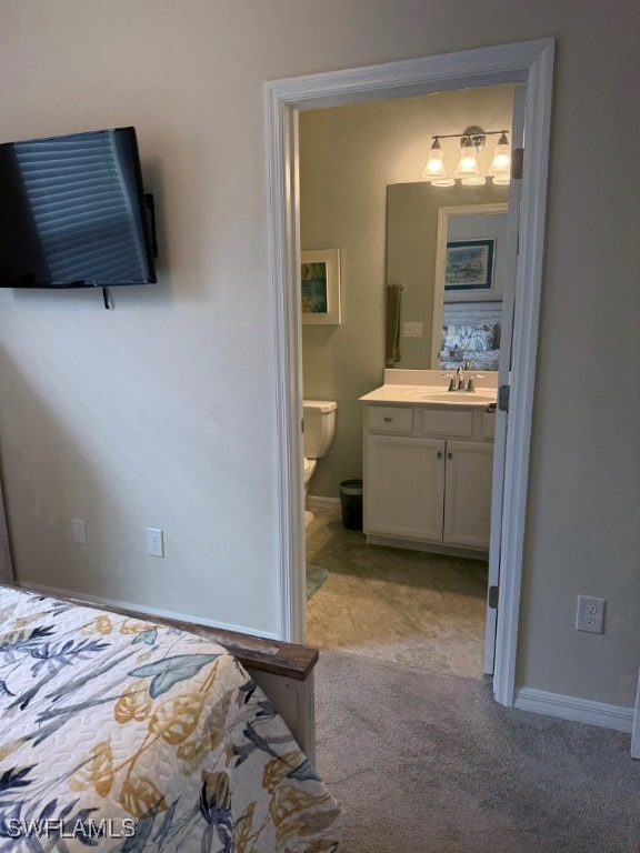 16249 Bonita Landing Cir, Bonita Springs, FL 34135 - bedroom with ensuite bath and light colored carpet