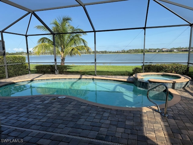 16249 Bonita Landing Cir, Bonita Springs, FL 34135 - view of swimming pool featuring a lanai, a water view, and a patio area