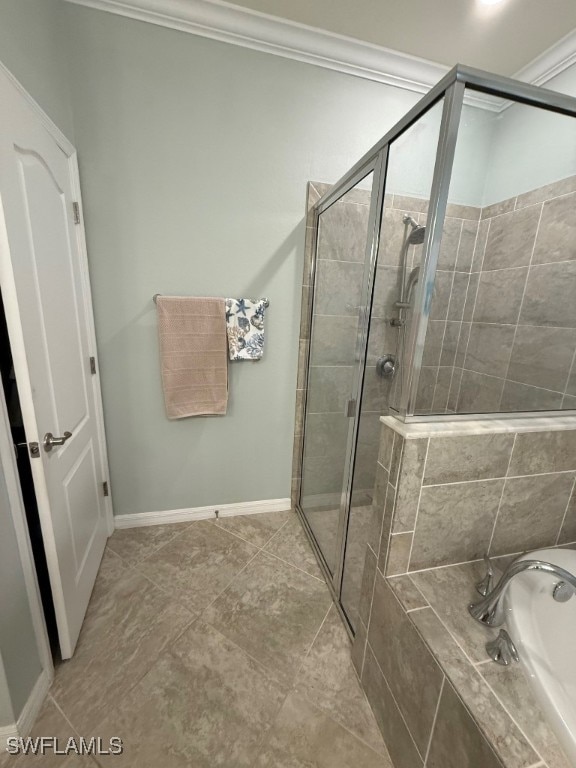 16249 Bonita Landing Cir, Bonita Springs, FL 34135 - full bath with a bath, a stall shower, crown molding, and tile patterned floors