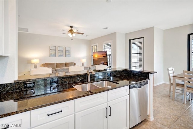 11830 Paseo Grande Blvd Unit 4608, Fort Myers, FL 33912 - kitchen featuring dishwasher, a sink, white cabinets, and dark stone countertops
