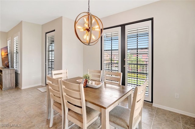 11830 Paseo Grande Blvd Unit 4608, Fort Myers, FL 33912 - dining area with a chandelier, healthy amount of natural light, baseboards, and light tile patterned floors