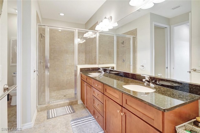 11830 Paseo Grande Blvd Unit 4608, Fort Myers, FL 33912 - bathroom with toilet, double vanity, a shower stall, tile patterned floors, and recessed lighting
