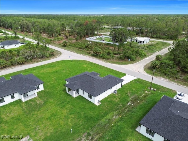 643 Knapp St, Lehigh Acres, FL 33974 - bird's eye view of a heavily wooded area