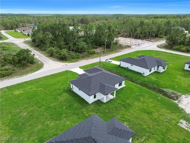 643 Knapp St, Lehigh Acres, FL 33974 - bird's eye view of a heavily wooded area