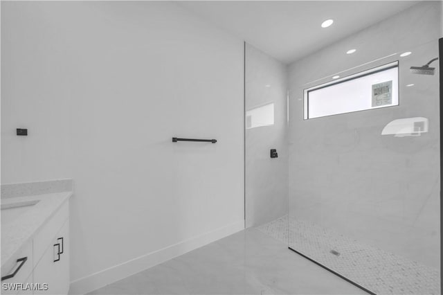 643 Knapp St, Lehigh Acres, FL 33974 - full bathroom with walk in shower, vanity, baseboards, and marble finish floors