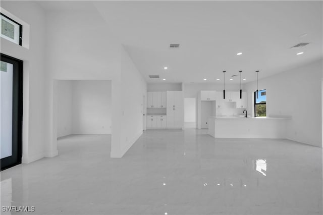 643 Knapp St, Lehigh Acres, FL 33974 - unfurnished living room featuring recessed lighting