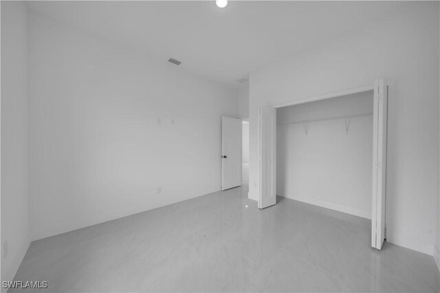 643 Knapp St, Lehigh Acres, FL 33974 - unfurnished bedroom with a closet
